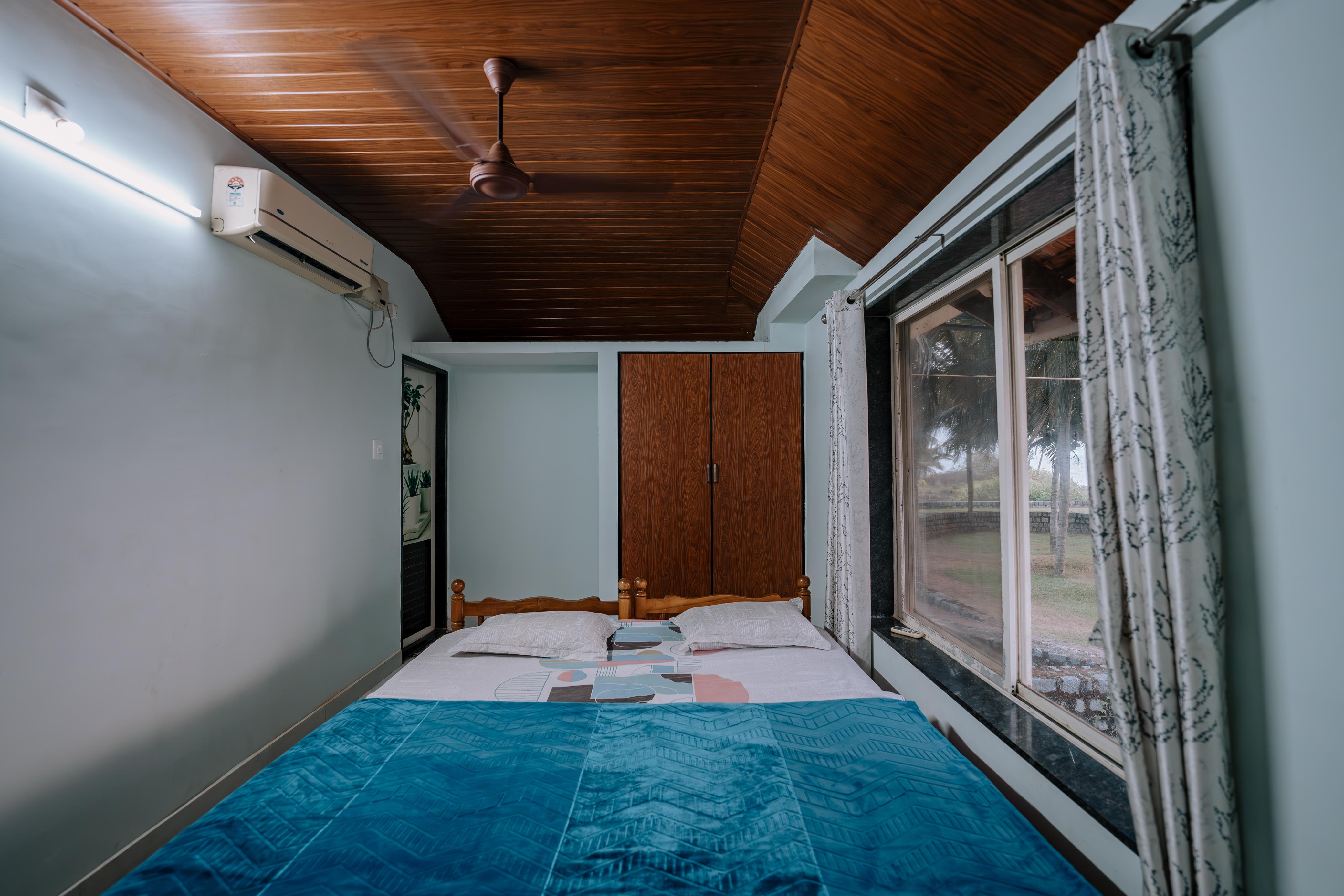 Main Unit Bedroom 1 with Wooden Ceilings